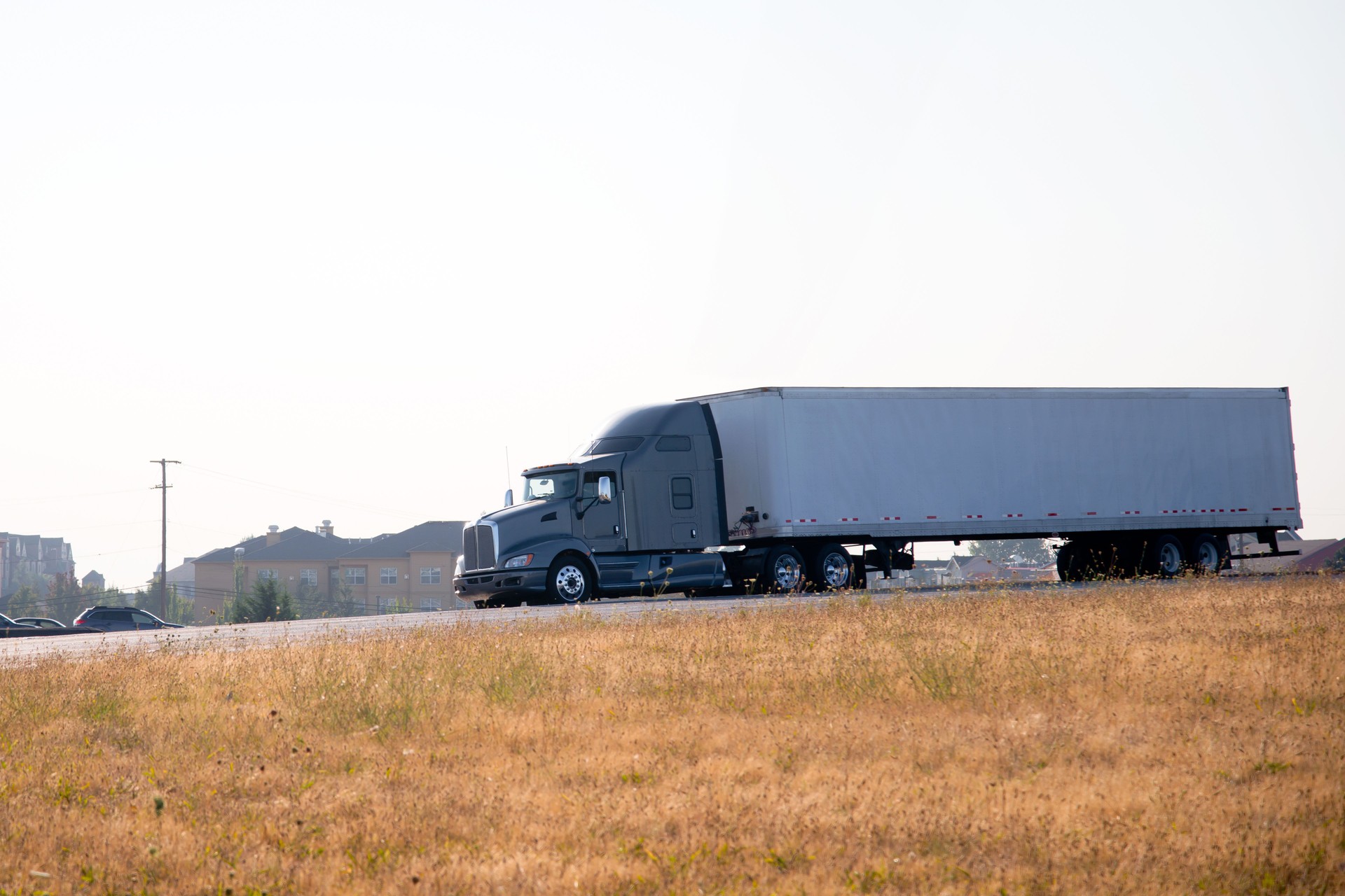 Modern elegant powerful semi truck big rig side view